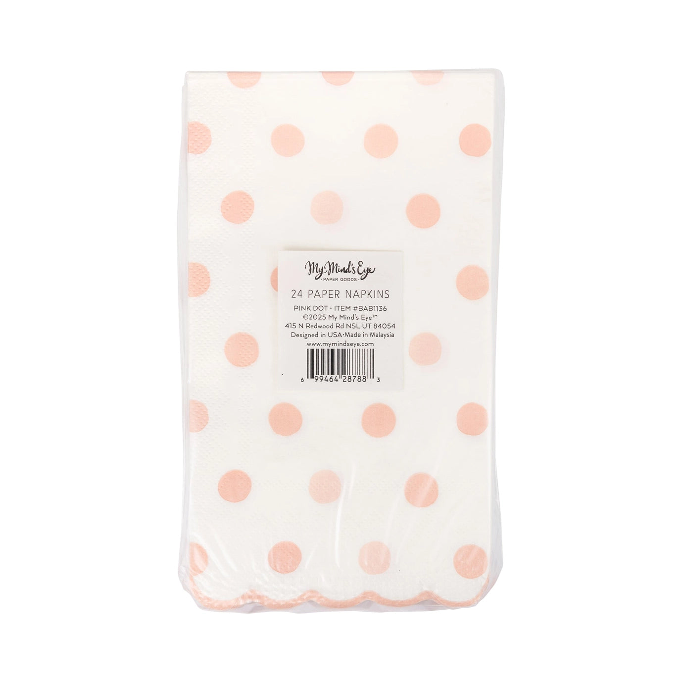 Pack of paper napkins with pink polka dots on a white background
