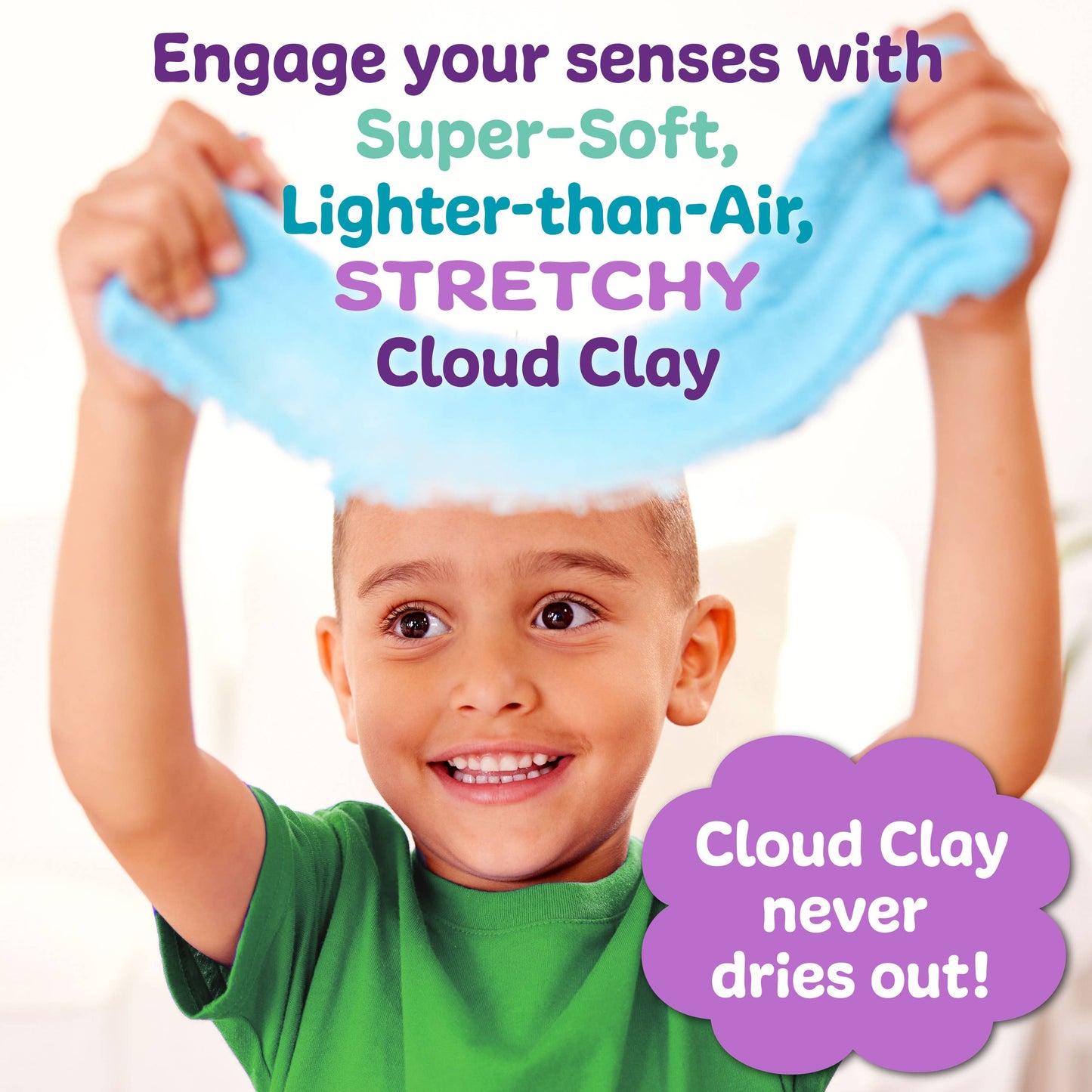 Child playing with stretchy blue cloud clay against a white background