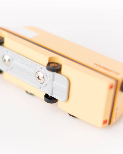 Gold and silver pencil sharpener on a white background