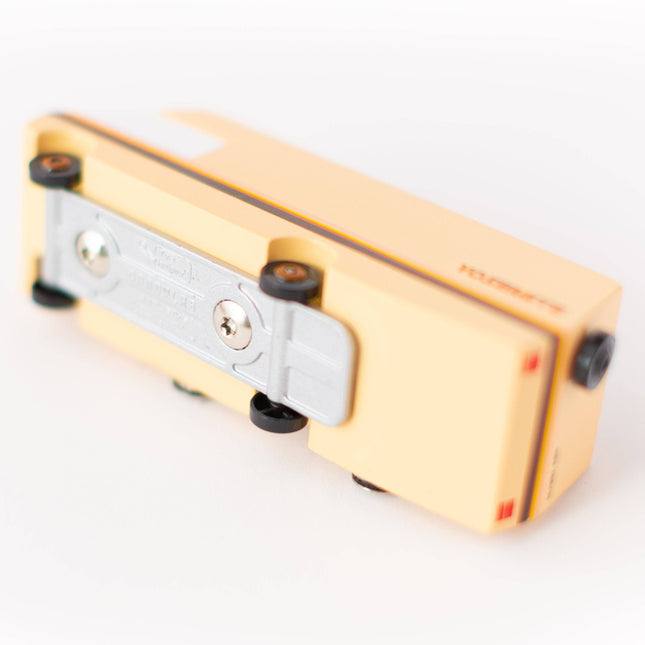 Gold and silver pencil sharpener on a white background