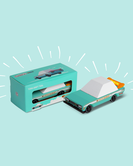 Model car and packaging on a light blue background