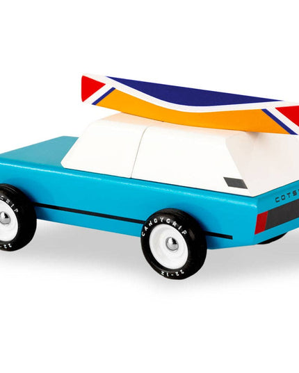 Toy car with a colorful roof on a white background