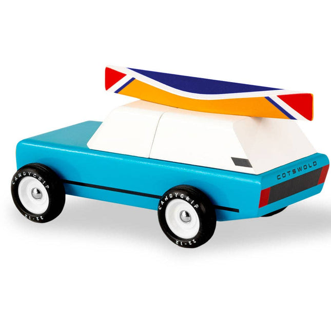 Toy car with a colorful roof on a white background