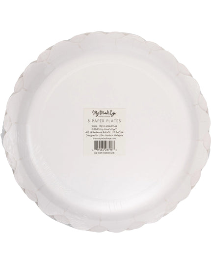 Stack of white paper plates with a label on a white background