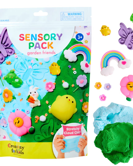Sensory pack with garden-themed toys and playdough, featuring a colorful package and various toys on a white background.