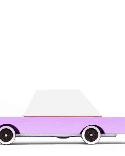Toy car with a purple body and white top on a white background