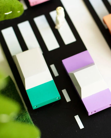 Colorful rectangular blocks on a black and white striped background
