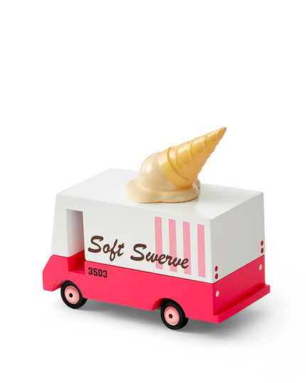 Toy ice cream truck with a cone on top against a white background