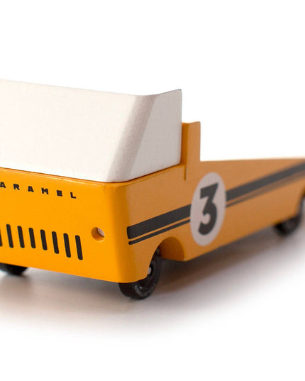 Toy truck with 'Caramel' branding and number '3' on a white background
