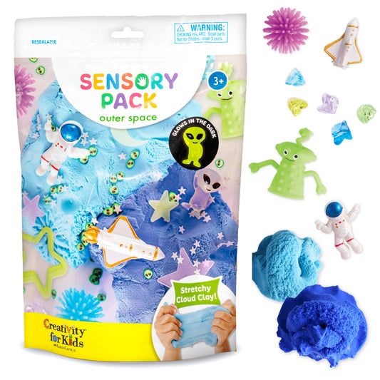 Sensory pack for kids with space-themed items and blue stretchy cloud clay.