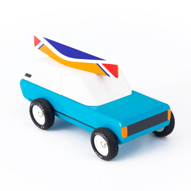 Toy car with a colorful rocket on top on a white background