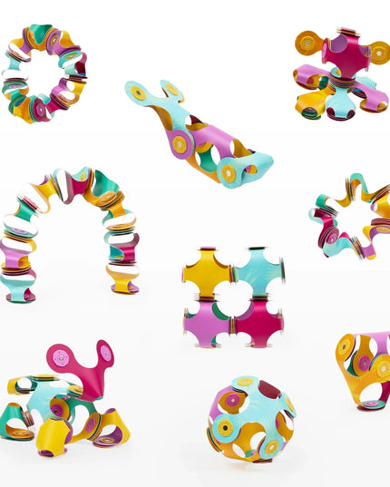 Colorful magnetic toys on a white background