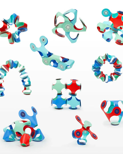 Colorful magnetic toys on a white background