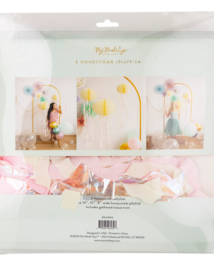 Packaging of honeycomb jellyfish decorations with images of a woman and decorations inside.