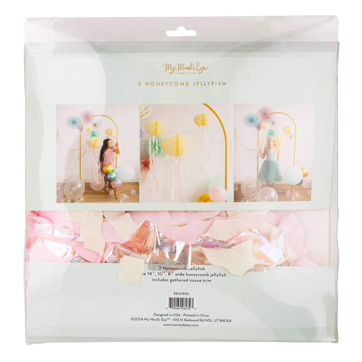 Packaging of honeycomb jellyfish decorations with images of a woman and decorations inside.