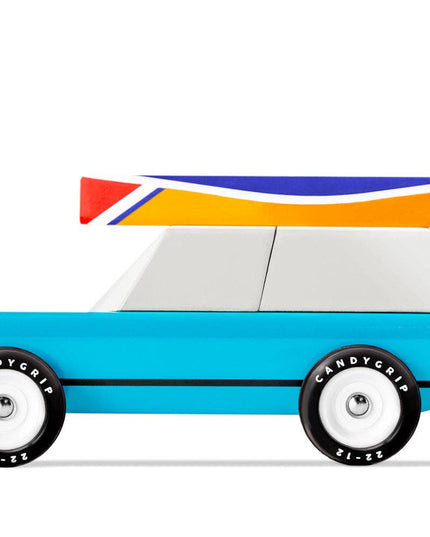 Colorful toy car with magnetic attachment on a white background