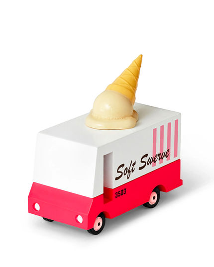 Toy ice cream truck with a cone on top against a white background