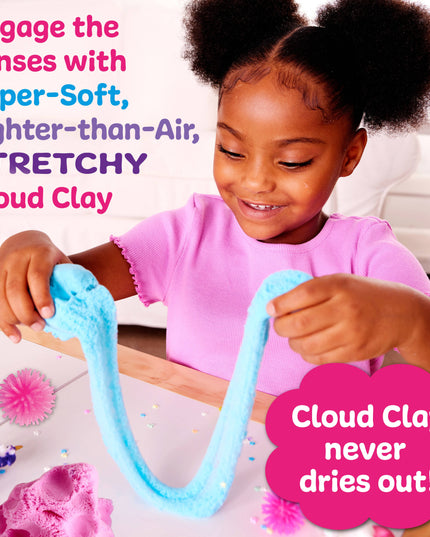 Child playing with blue Cloud Clay, surrounded by colorful decorations.