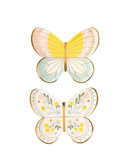 Two butterfly-shaped paper plates with floral designs on a white background