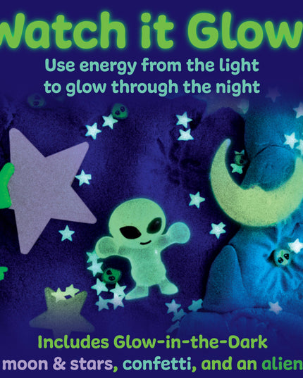 Glow-in-the-dark toys including an alien, moon, and stars on a dark background with text 'Watch it Glow!'.