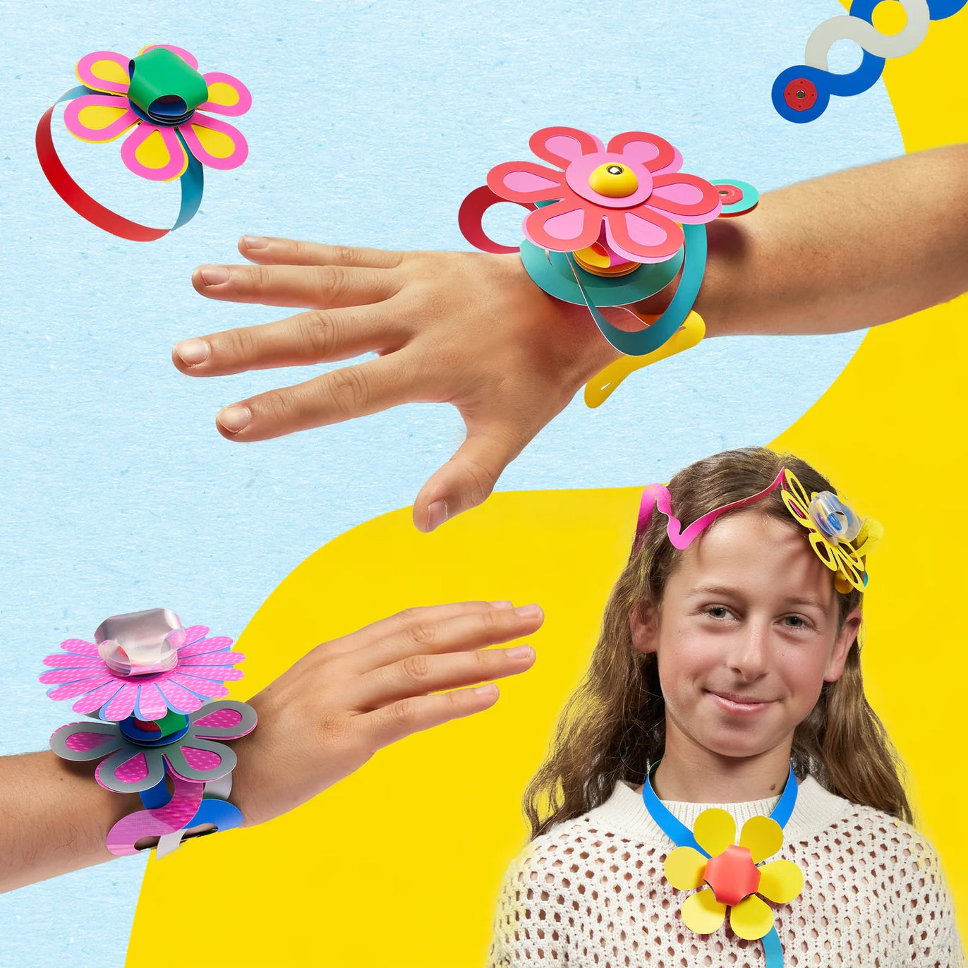 Children wearing colorful Clixo flower-shaped headbands and bracelets against a bright background
