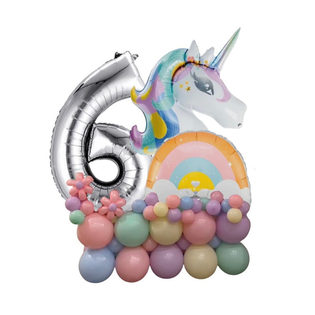 Pastel-colored balloon arrangement with a unicorn and number 6 on a white background