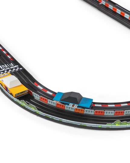 Toy race track set with a car on a white background
