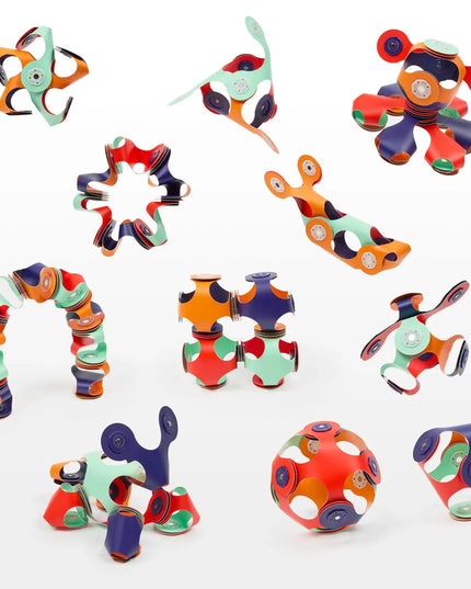 Colorful magnetic toys on a white background