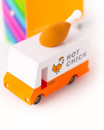Toy food truck with 'Hot Chick' branding on a white background
