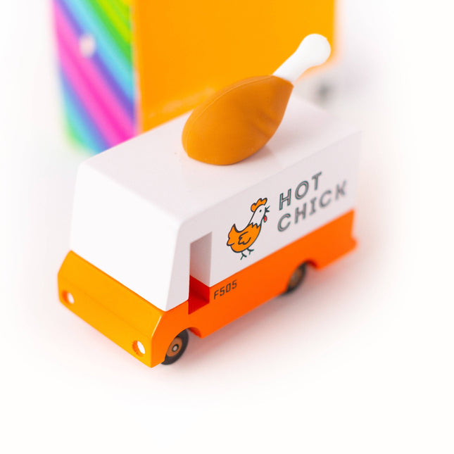 Toy food truck with 'Hot Chick' branding on a white background