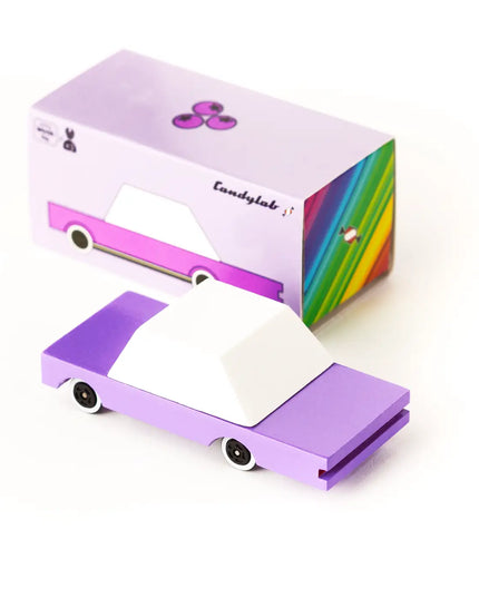 Purple candy bar wrapper with a rainbow design on a white background