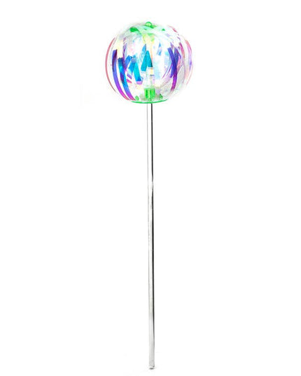 Colorful glass ball on a stick against a white background