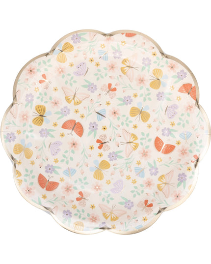 Decorative plate with butterfly and floral pattern on a white background