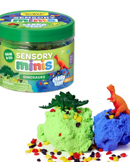 Sensory minis dinosaur play set with green and blue clay and colorful sprinkles on a white background