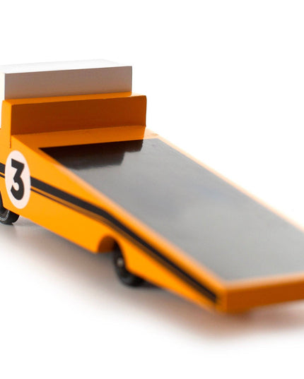 Toy car with a flatbed and number 3 on a white background