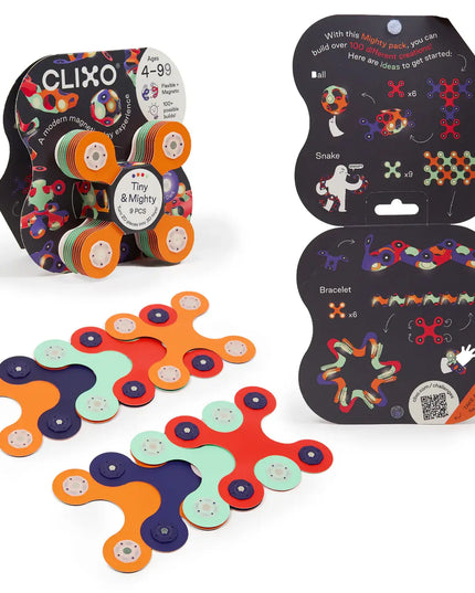 Colorful magnetic building toys with packaging on a white background
