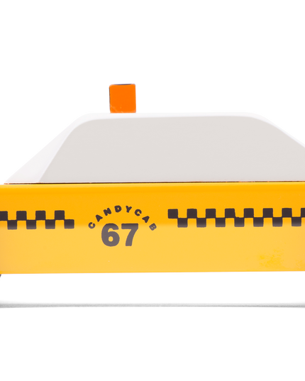 Toy taxi with a white top and yellow body on a white background