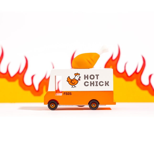 Van with 'Hot Chick' branding on a white background with flames.