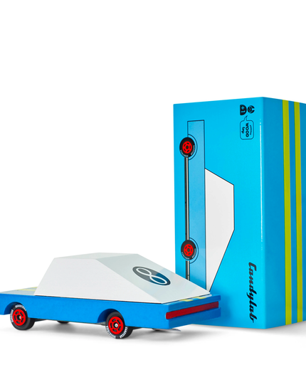 Toy truck with a blue box on a white background
