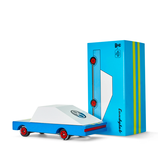 Toy truck with a blue box on a white background